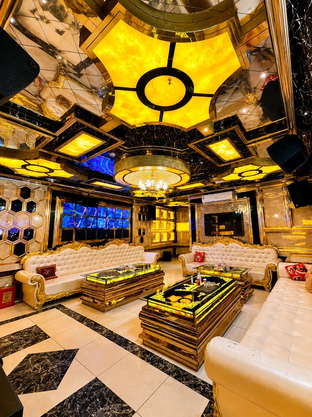 Elegant golden karaoke room with chandelier in Da Nang
